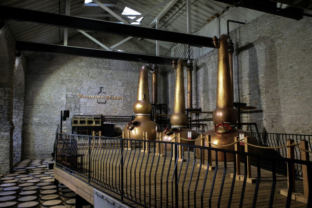 Copper stills in a distillery during spirits production